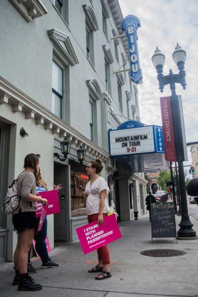 Member of the Progressive Student Alliance stand outside the Bijou ready to peacefully protest Pence and Blackburn policies on Sept. 21, 2018.