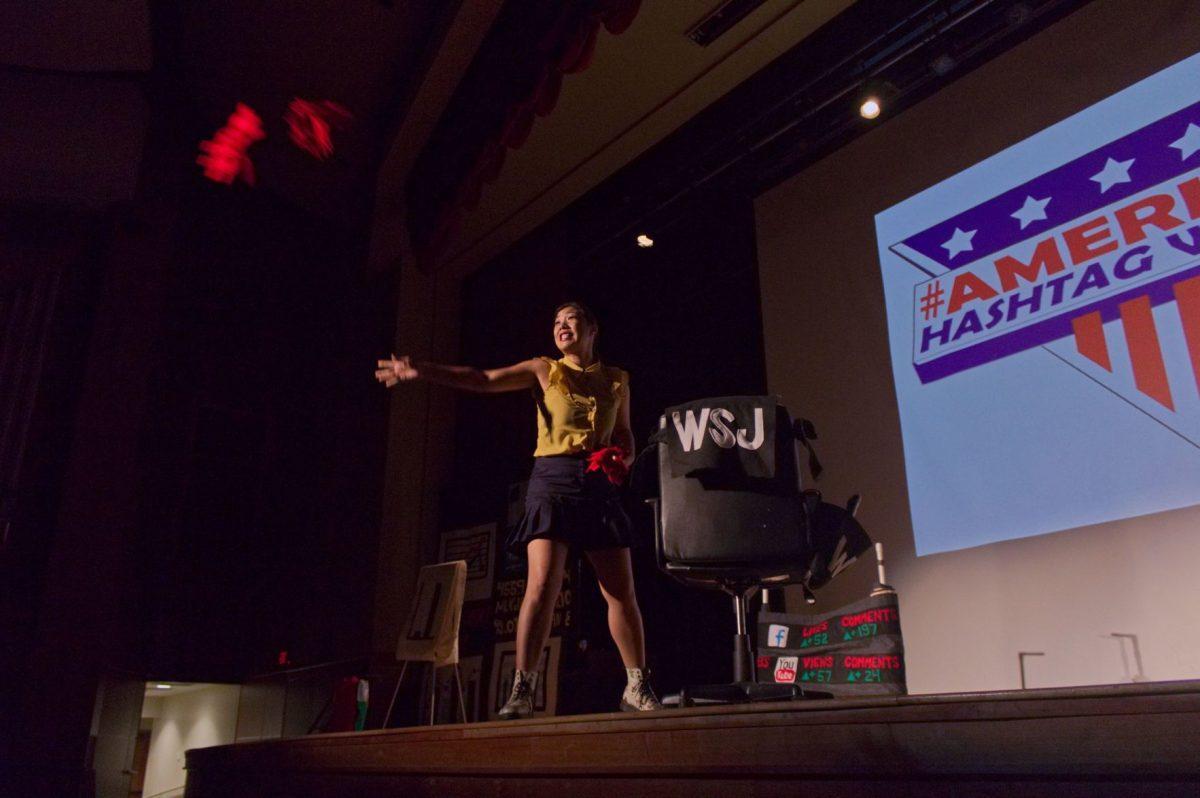 Kristina Wong throws hashtags into the crowd to simulate a tweet going viral on Sept. 11, 2018.