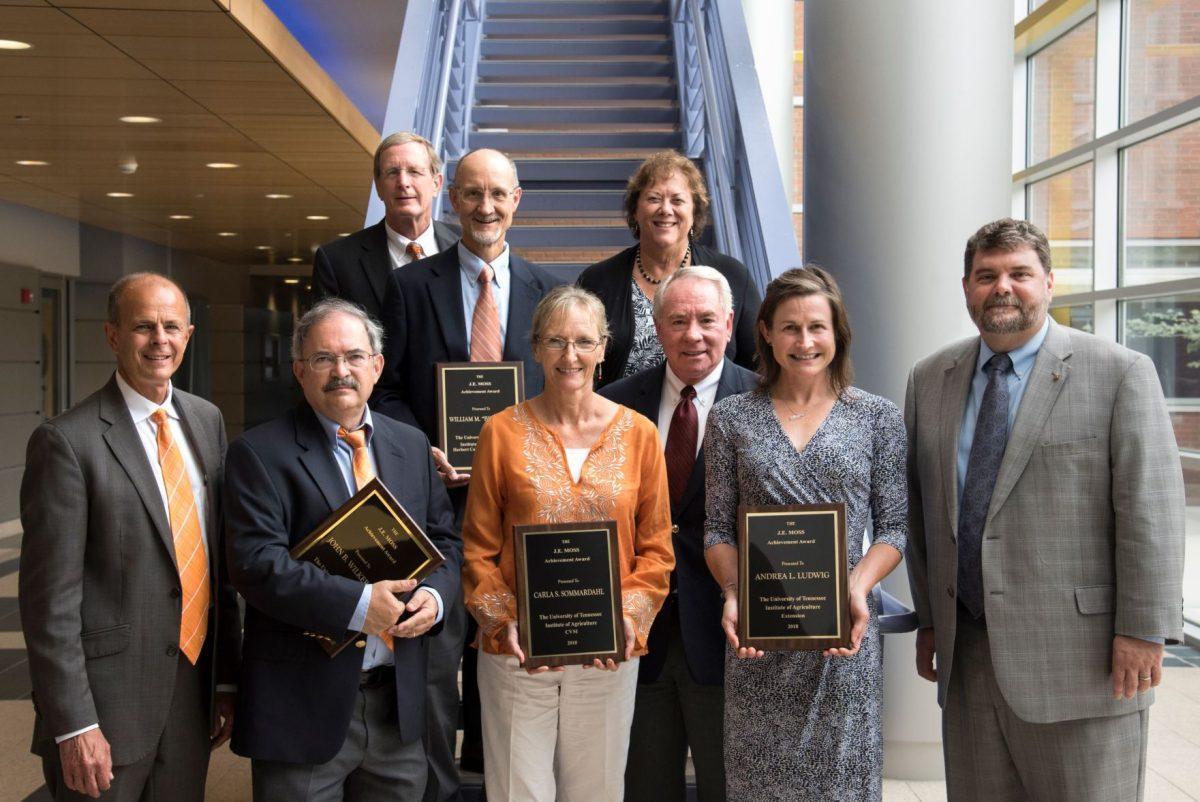 The winners of the Moss Award. Each winner is from a unit in the UTIA. From left to right front row:  Dr. Tim Cross, Dr. John Willkerson, Dr. Carla Sommardhal, Dr. Fred Tompkins, Dr. Andrea Ludwig, Dr. Robert Burns. Back row from left to right: Dr. Jim Thompson, Dr. Bill Park, Dr. Caula Beyl.