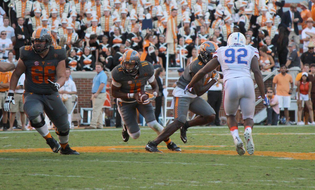 Josh Dobbs, #11, runs the ball against Florida defense on Sep. 24, 2016.