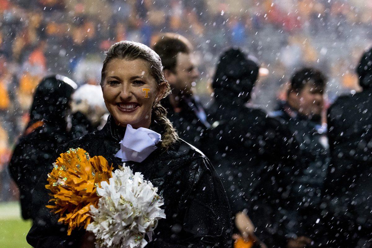 The Tennessee cheer team perform under the rain during the game against LSU at Neyland Stadium on Nov. 18, 2017.