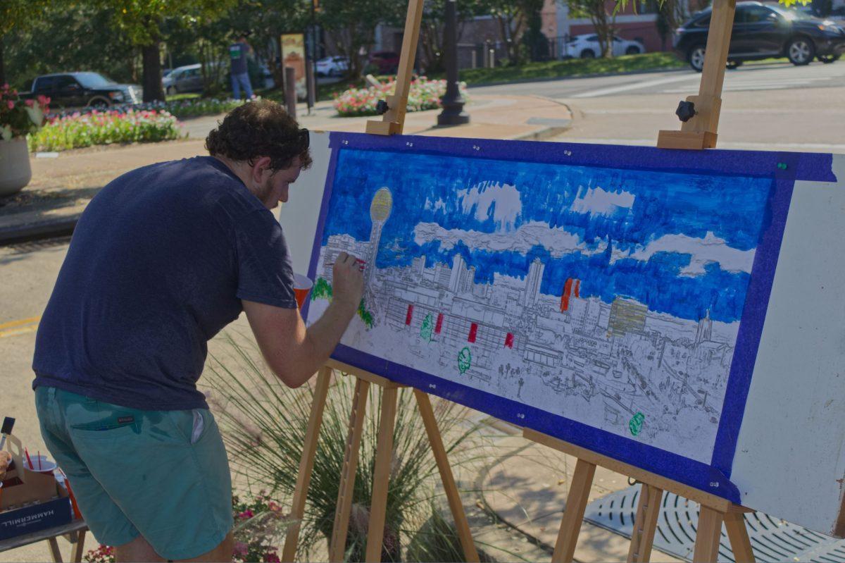 Many arts and crafts, including sidewalk chalk and water coloring, are available to participants of Park(ing) Day on Sept. 21, 2018 in downtown Knoxville.