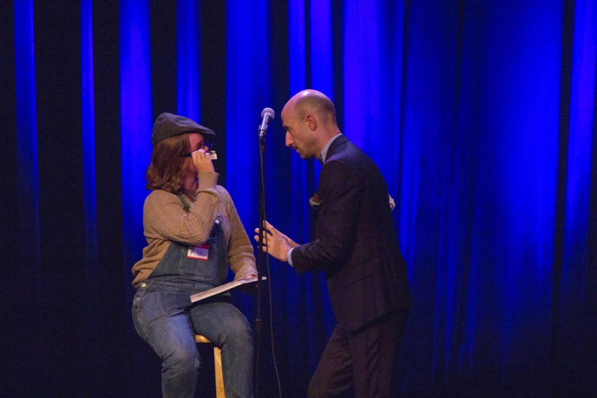 Cecil Baldwin (right) talks to an audience member (right) on stage during the Welcome To Night Vale show at the Bijou Theatre on October 1, 2018.