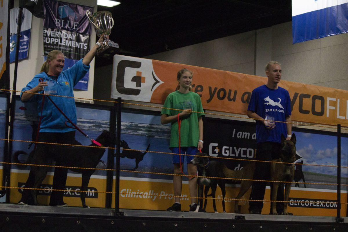 From left to right, Crystal McClaran and Whiplash, Sydney Mackey and Spitfire, and Dane Seidlitz and Aegon won first through third respectively in the Super Elite Big Air competition of the Dock Dogs 2018 World Championships.