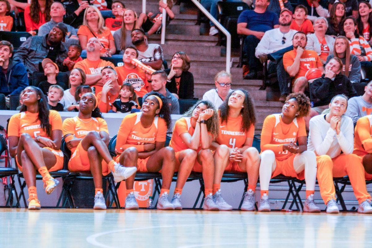 The Tennessee Women's Basketball Team watches the Jumbotron at the Rocky Top Tip Off event at Thompson-Boling Arena on Oct.19, 2018.