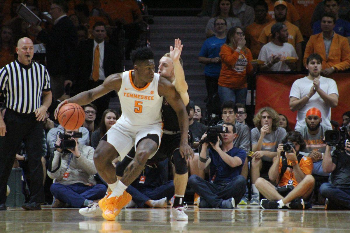 Admiral Schofield, #5, dribbles the ball during game against Lenior-Rhyne on Nov. 6, 2018 at Thompson-Boling Arena.