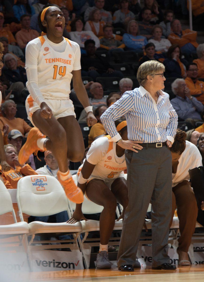 Zaay Green, #14, celebrates next to Coach Holly Warlick during game against Presbyterian on Nov. 11, 2018 at Thompson-Boling Arena. 