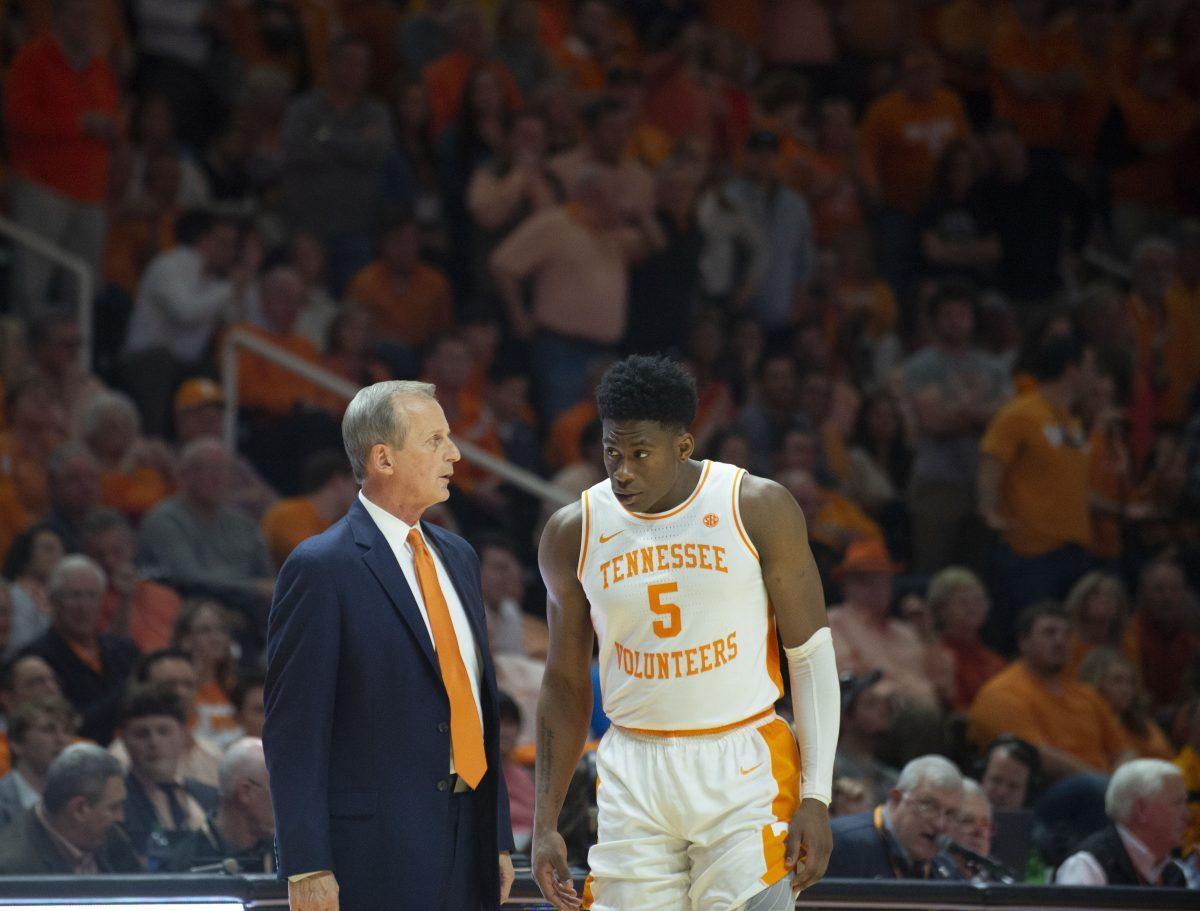 Head Basketball Coach Rick Barnes talks with Admiral Schofeild , #5, during game against West Virginia on Jan. 26, 2019 at Thompson-Boling Arena.