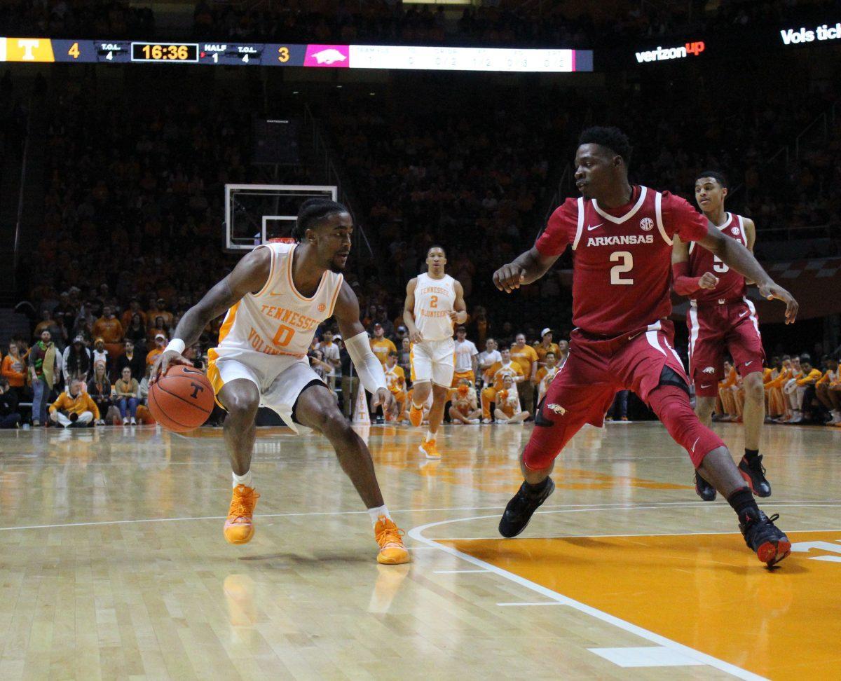 Jordan Bone, #0, against Arkansas defender during game on Jan. 15, 2019 at Thompson-Boling Arena