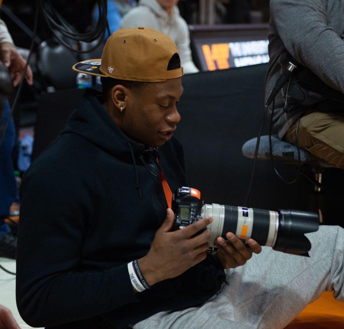 Admiral Schofield takes pictures during the women's basketball game against Florida on Jan. 31, 2019 at Thompson-Boling Arena.