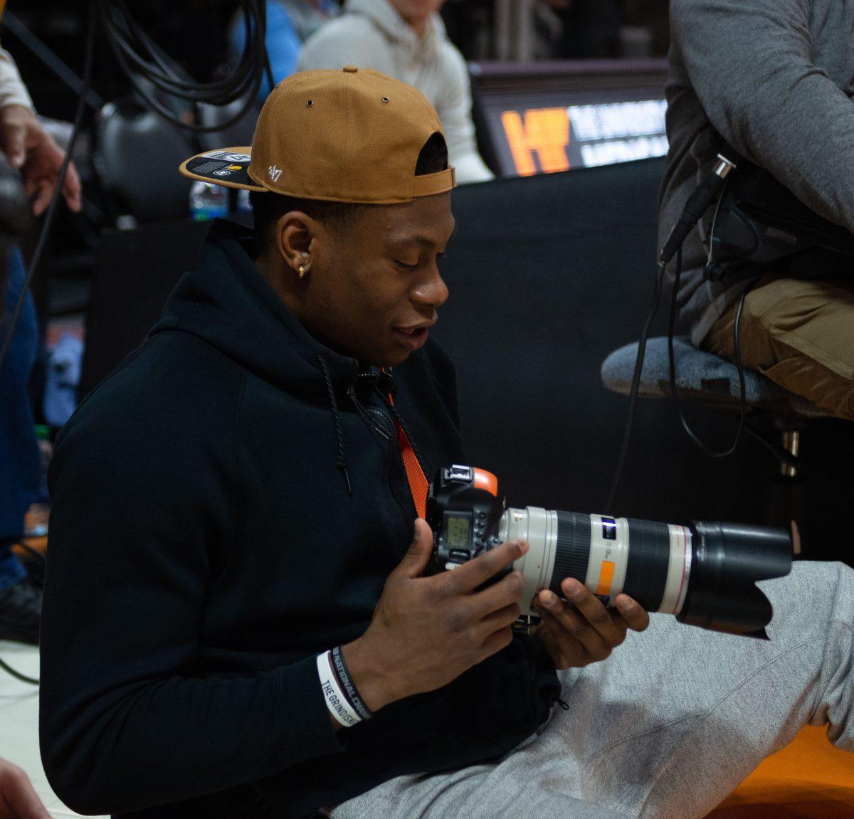 Admiral Schofield takes pictures during the women's basketball game against Florida on Jan. 31, 2019 at Thompson-Boling Arena.