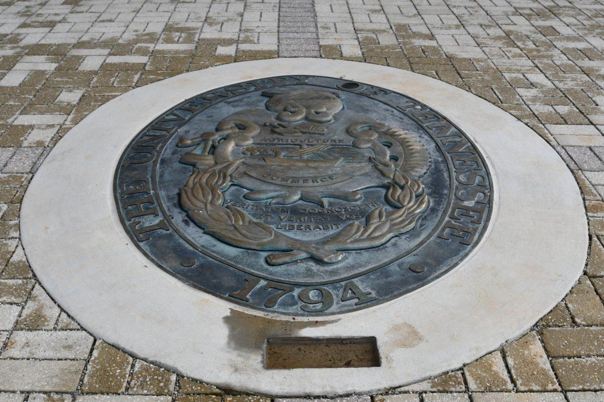 The seal from the old University Center sits outside the Student Union. 