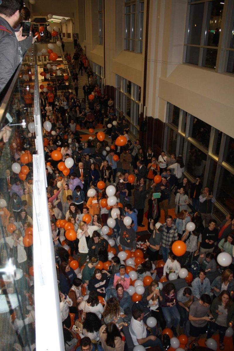 The UT community celebrates the unveiling of the glass torch sculpture in the newly completed Student Union on Jan. 8, 2018. 