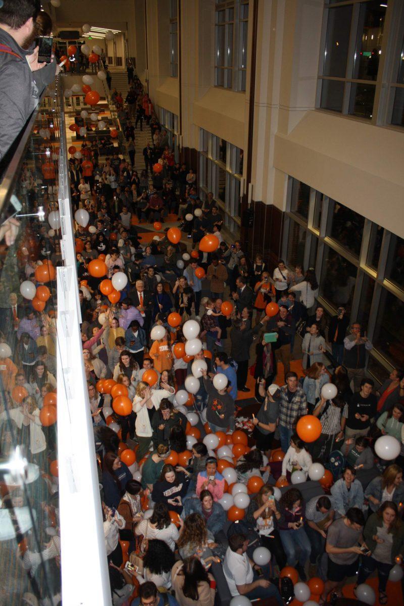 The UT community celebrates the unveiling of the glass torch sculpture in the newly completed Student Union on Jan. 8, 2018. 