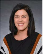 Social worker and faculty member, Stacia Martin West looks to alleviate poverty through studies and community work.