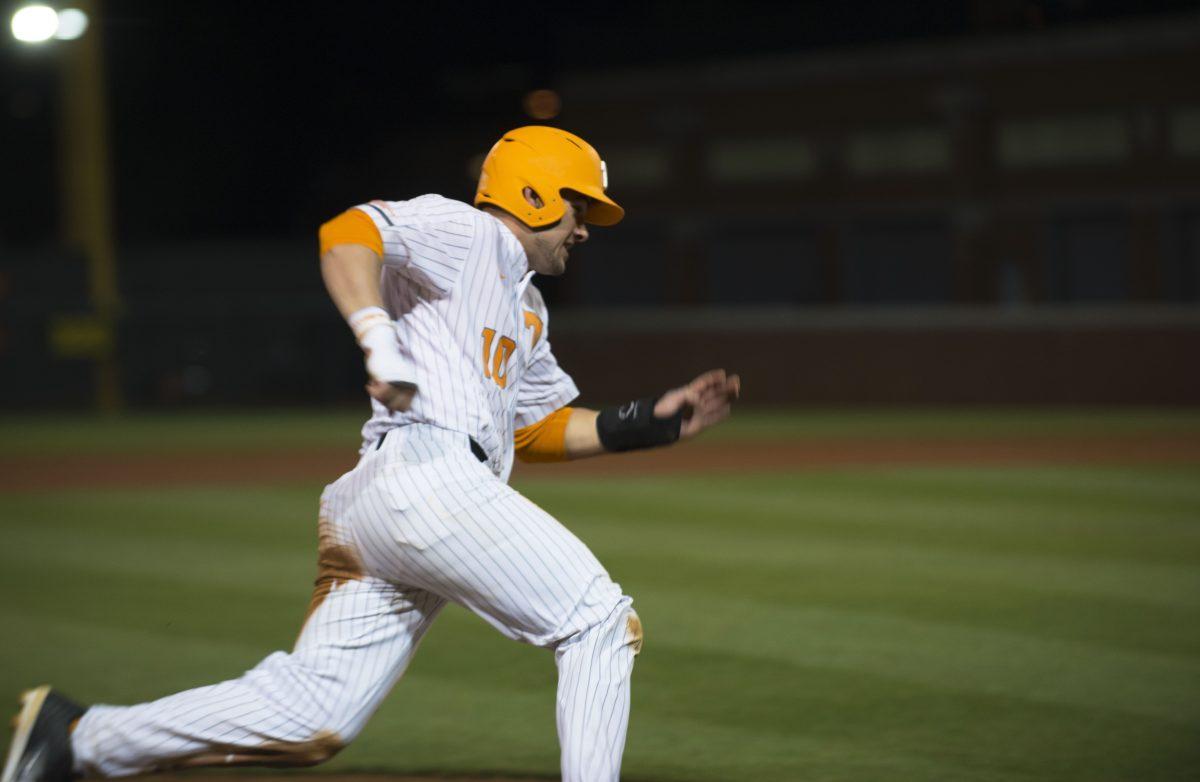 UT first Baseman, Pete Derkay, heads for home plate on March 23, 2018.