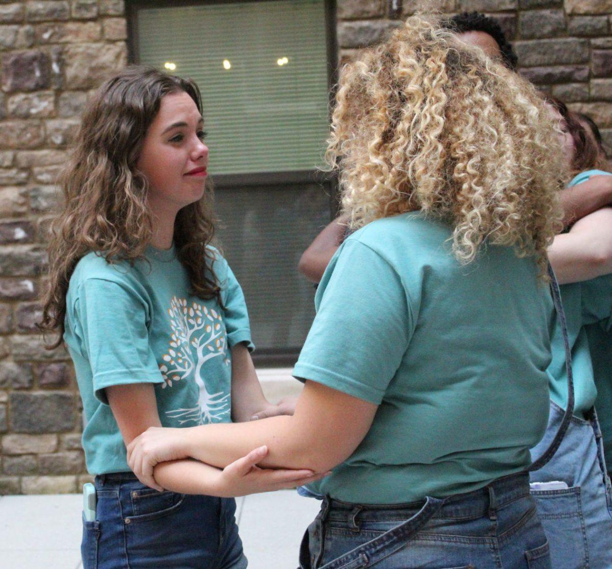 Paige Shimer and Kenzie Bastian share a moment after hearing the results of the 2019 SGA elections on Wednesday April 17, 2019 at The Standard Courtyard. 