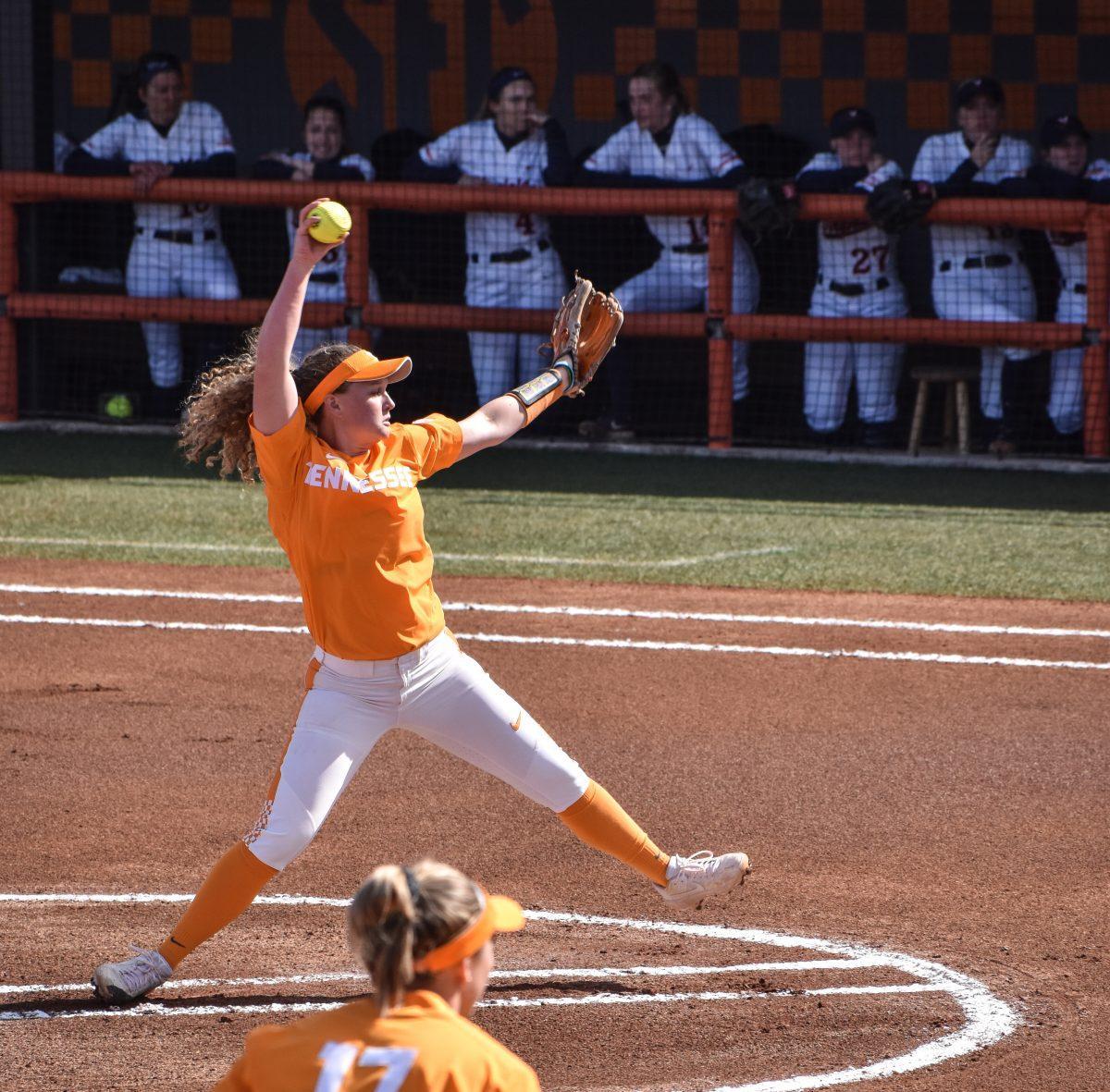 #12, Caylan Arnold pitches against the University of Virginia on Monday Feb. 25, 2019 at Sherri Parker Lee Stadium.