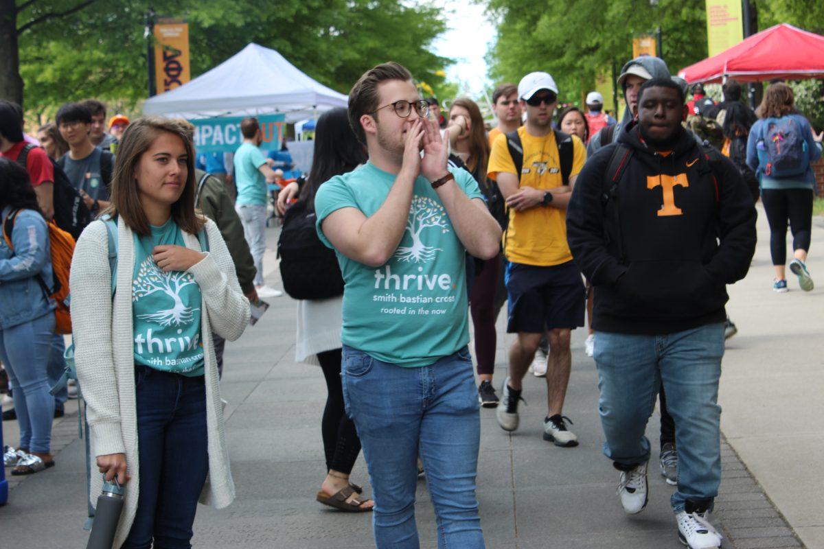 Chad Smith, Thrive's presidential candidate, calls to students on Ped Walkway to discuss his campaign's goals on Monday April 15, 2019. 