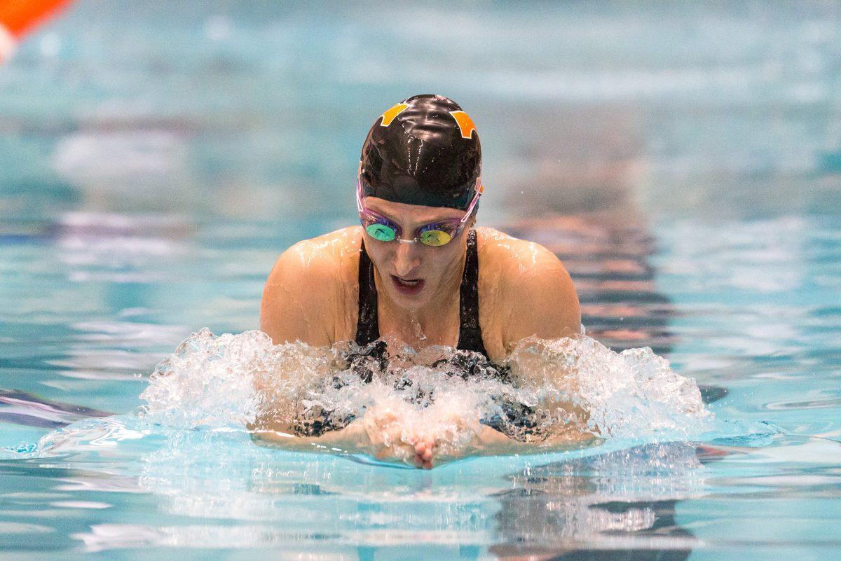 FILE - Meghan Small in the 100 breaststroke during the Tennessee Invitational at Allan Jones Intercollegiate Aquatic Center on Dec. 1, 2017.