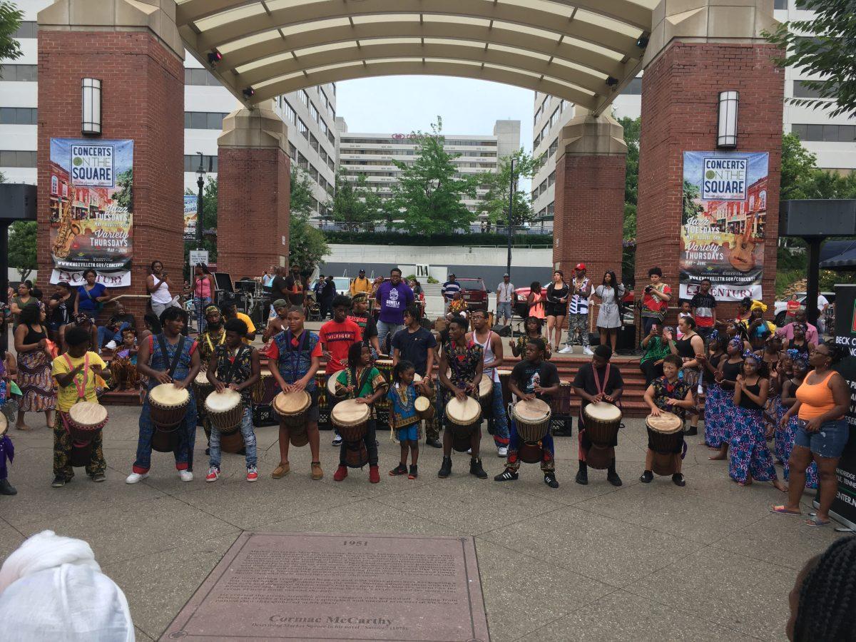 Local African Drum group Indigenous Vibes play together, setting the tone for the dancing performances with fast-paced music.