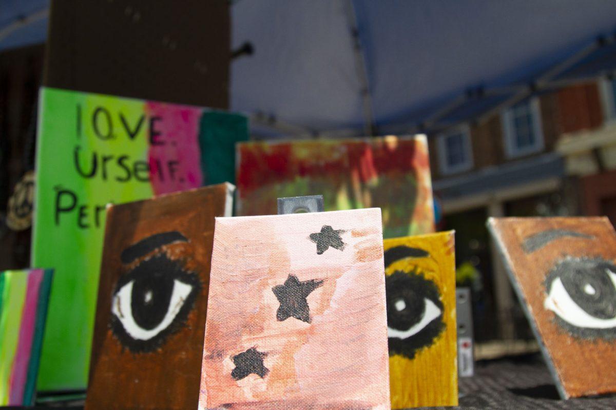 Artwork by Talyn Cook, who was selling her artwork alongside her father Adande Cook. 
