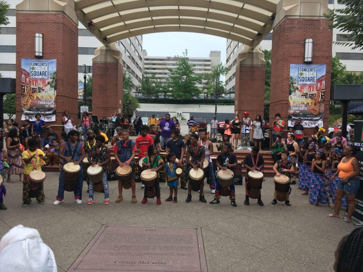 Local African Drum group Indigenous Vibes play together, setting the tone for the dancing performances with fast-paced music.