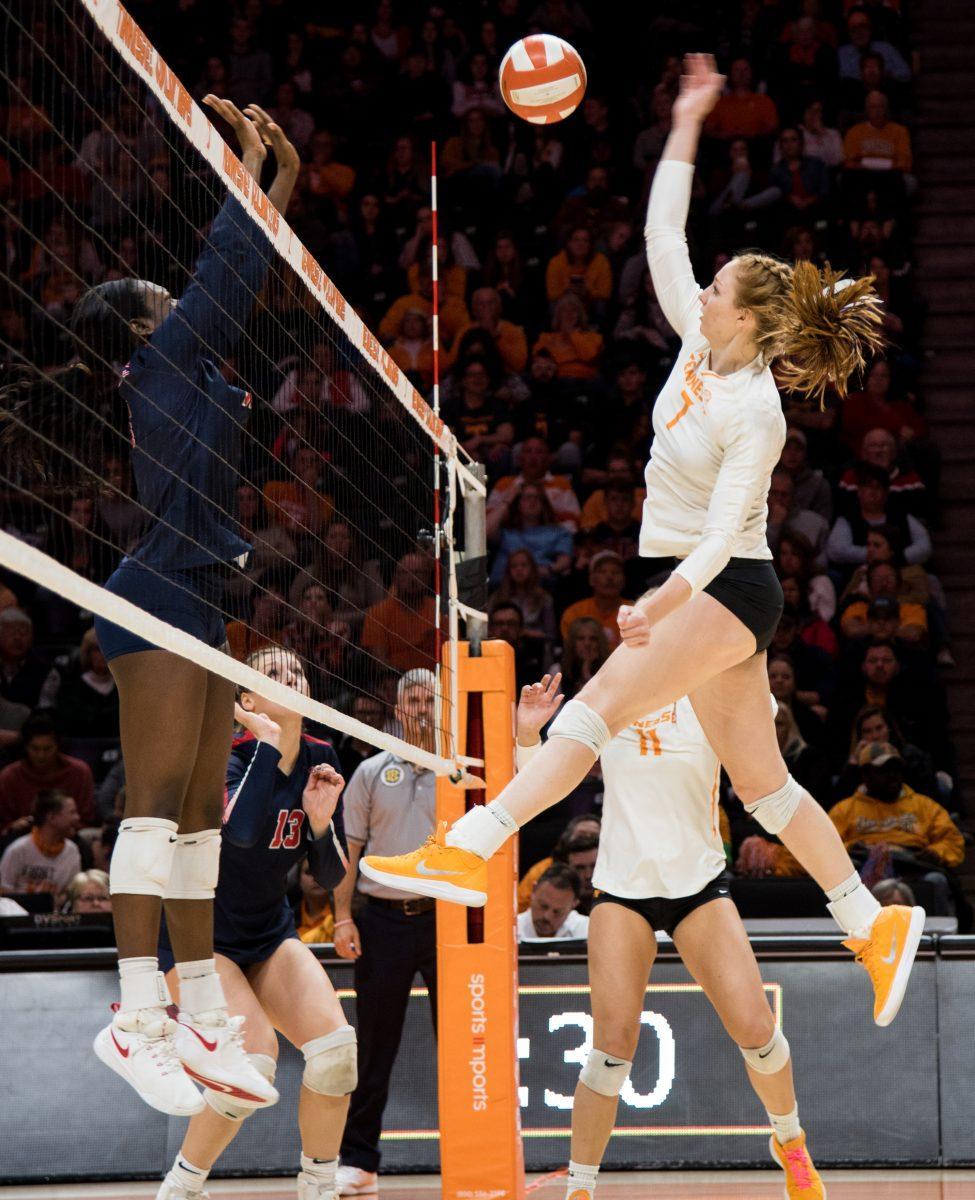Erica Treiber, #7, spikes the ball during game against Ole Miss on Nov. 24, 2018 at Thompson-Boling Arena.