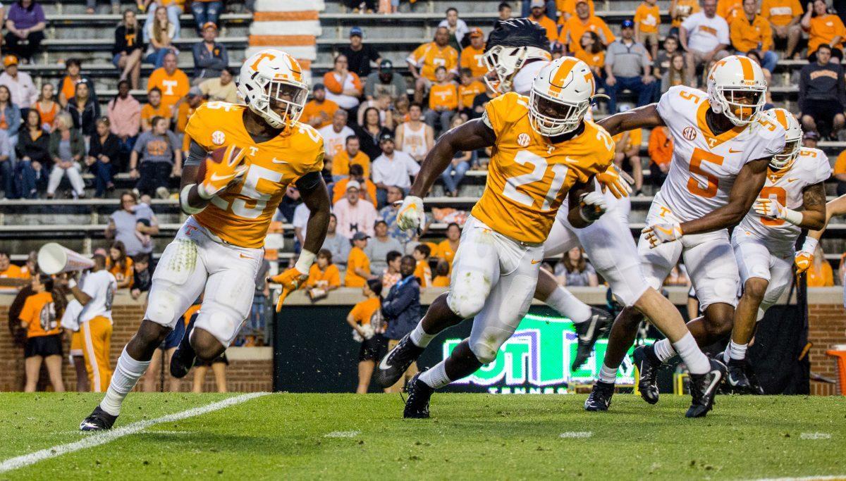 #25 Trevon Flowers and #21 Shannon Reid return a punt during the Orange and White game on Saturday April 13, 2019 at Neyland Stadium.