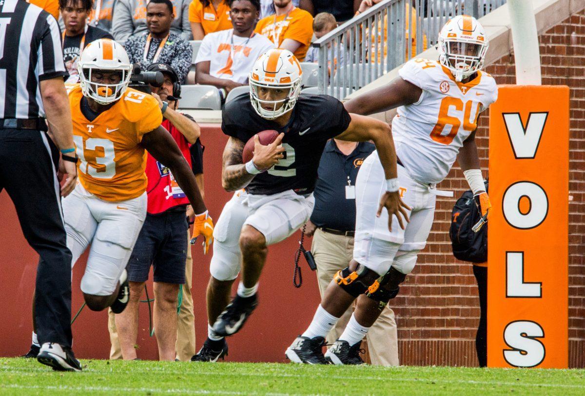 #2 Jarrett Guarantano carries the during the Orange and White game on Saturday April 13, 2019 at Neyland Stadium.
