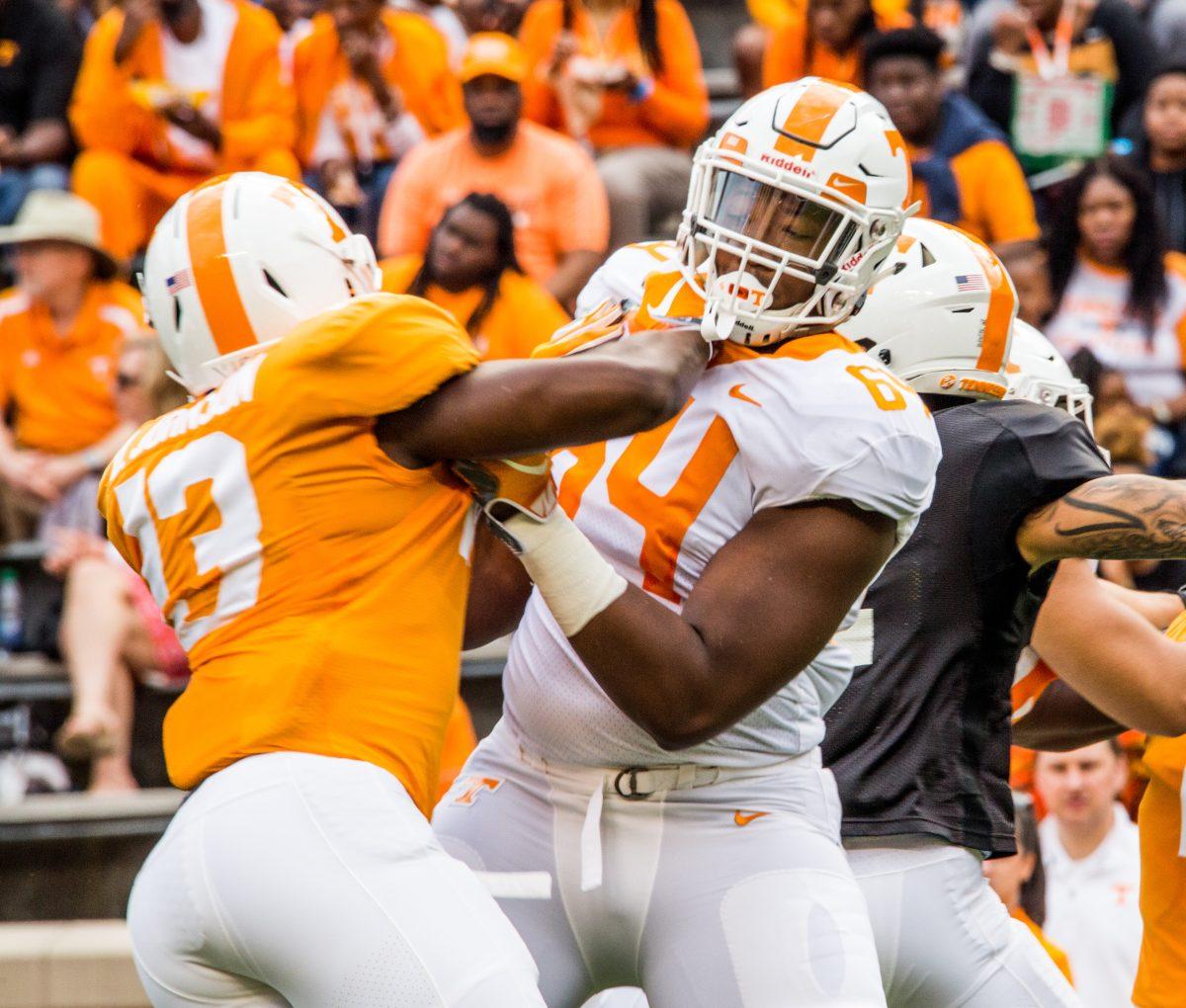 #64 Wanya Morris defends against #13 Deandre Johnson during the Orange and White game on Saturday April 13, 2019 at Neyland Stadium.
