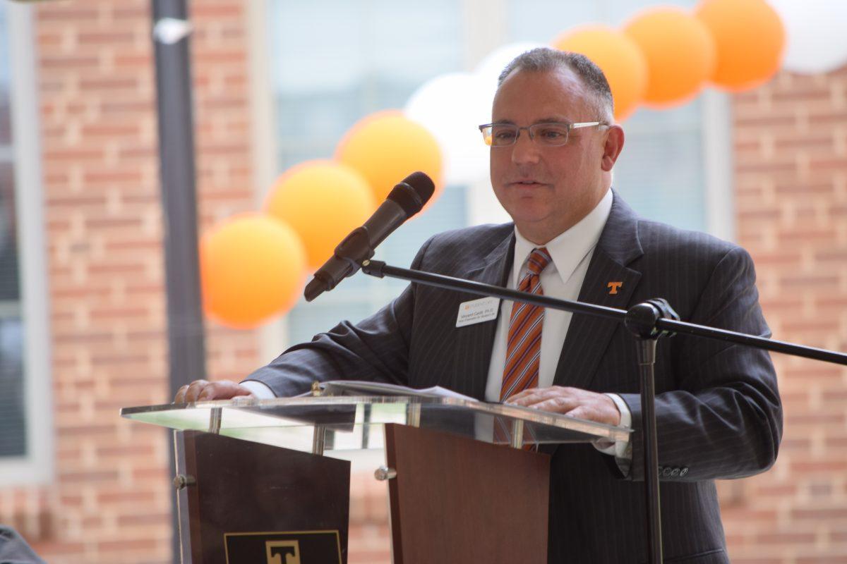Vice Chancellor of Student Life Vincent Carilli addresses the UT community during a ribbon cutting ceremony for the newly built Magnolia and Dogwood Residence Halls on the west side of campus on Friday, Aug. 23.