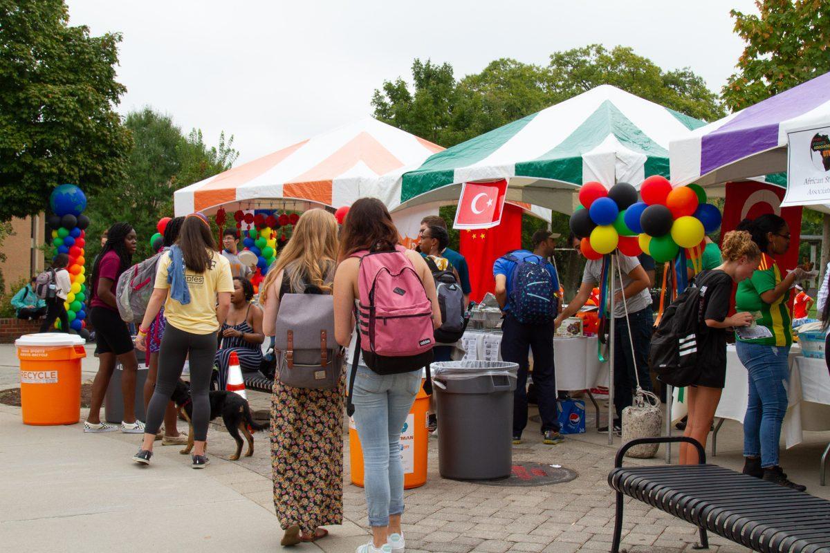 Students and community members attend the different booths to learn about the culture of different countries around the world at the 2019 International Festival on Ped Walkway on Friday, September 27. 
