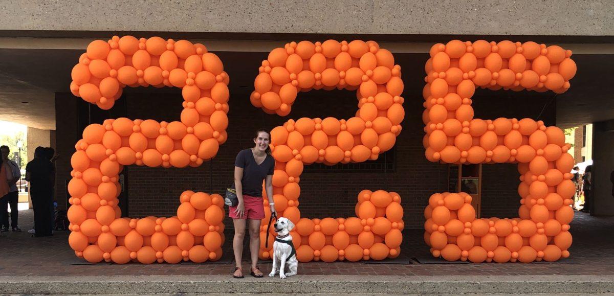 Wiggles the service dog and his trainer, Laura Porter, at the Big Orange Celebration on September 10, 2019.