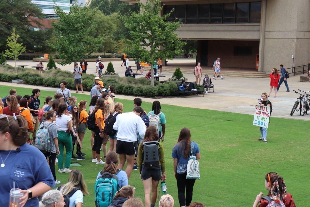 Senior studying environmental and soil science Kendall Wimberley takes charge of a crowd of climate change protesters on Friday, September 20, 2019.
 