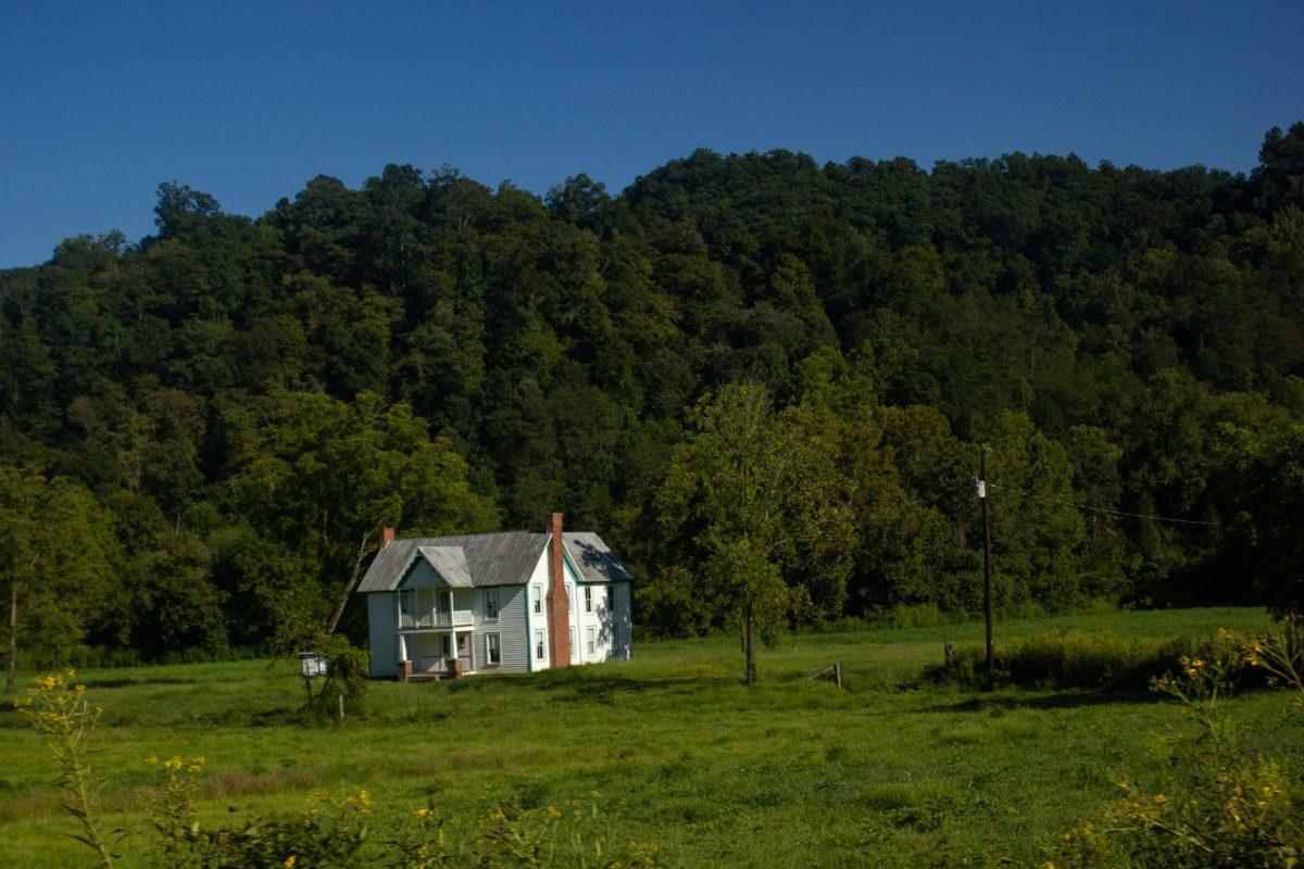 An old farmhouse sits just off the main road leading into Sneedville, Tennessee.