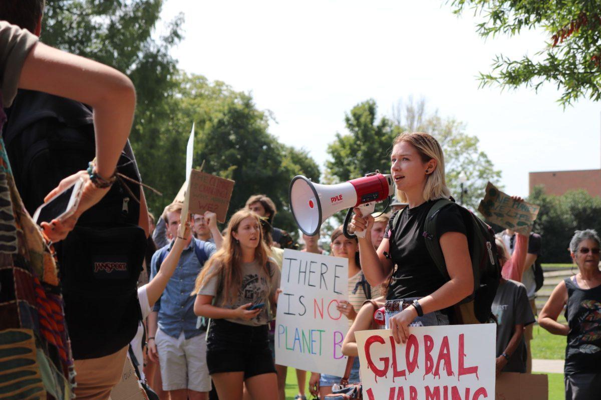 Senior studying environmental and soil science Kendall Wimberley rallies protestors for the march against climate change on Friday, September 20, 2019.
 