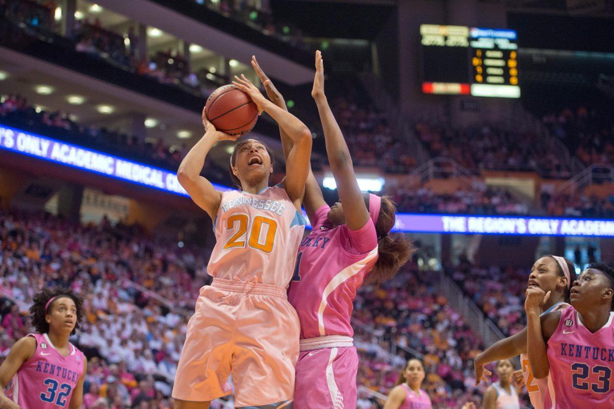 Tennessee junior center Isabelle Harrison absorbs contact and attempts a layup in the Lady Vols' 75-71 loss to Kentucky at Thompson-Boling Arena on Sunday.