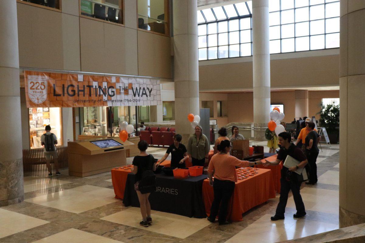 The UT community walk through Hodges Library on Tuesday, September 10, 2019 looking at the 'Lighting the Way' Exhibit which displays UT's 225 year history.