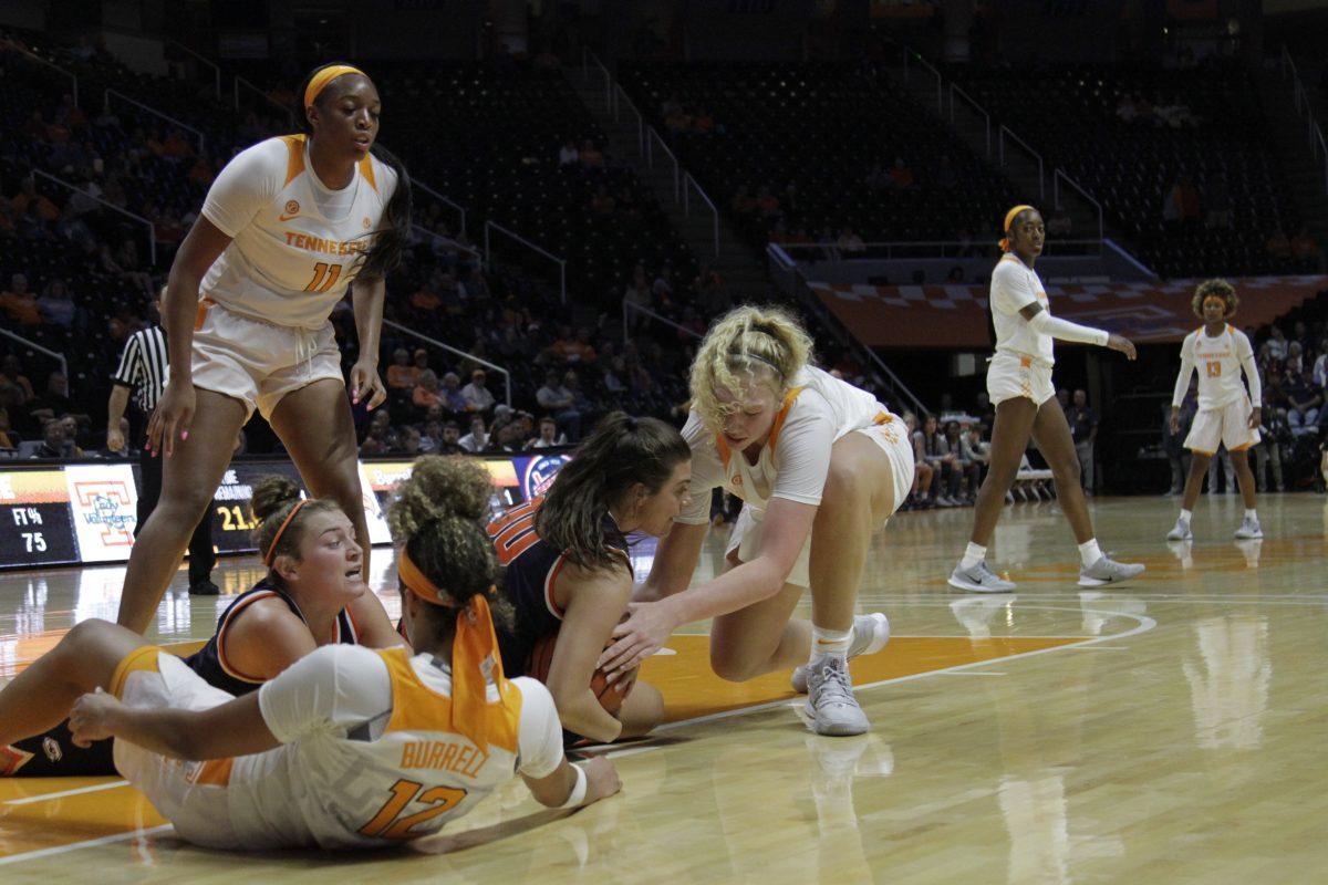 Lady Vol's players rush to the ground to grab the ball in the game against Carson-Newman at Thomas-Boiling Arena on Tuesday, October 29,2019 