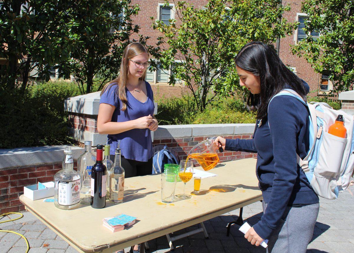 Center for Health Education and Wellness set up booths on Ped Walkway for Substance Abuse Prevention Month on Monday, October 14, 2019. One of the booths demonstrated the amount of alcohol that can go into different sized glasses. 
