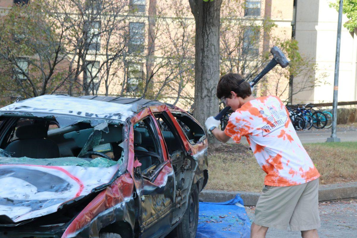 Students donated a dollar to smash a car representing Georgia to URHC on Friday, October 4, 2019 at Presidential Court.