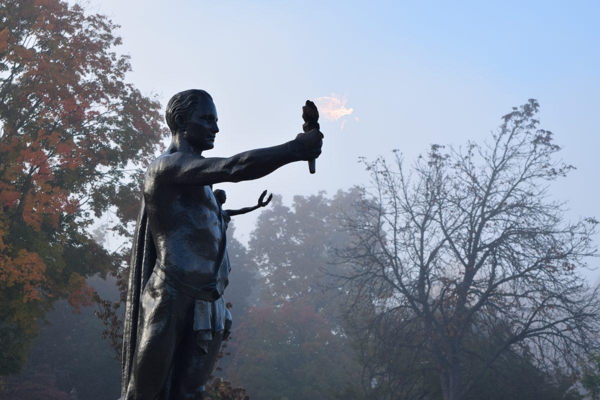 Torchbearer in the fog