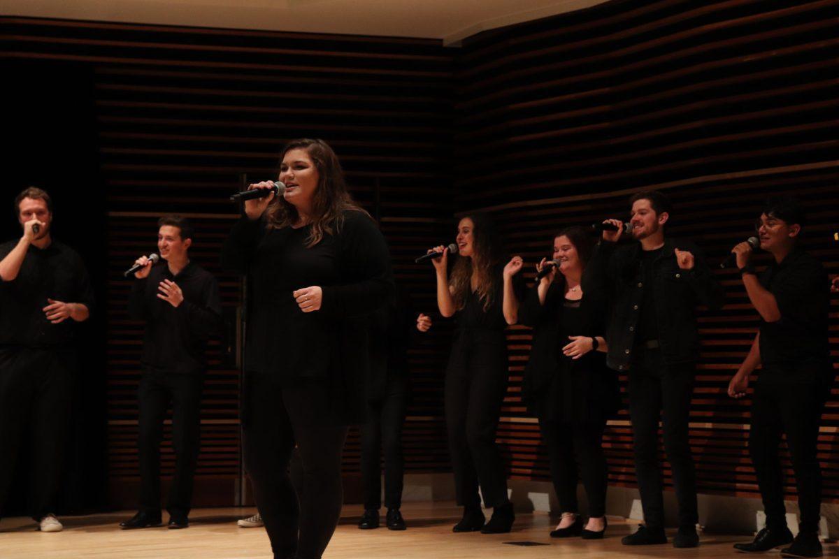 Performing alongside the support of her teammates, Ellie Smith takes center stage in her performance of Eric Carmen's "Make Me Lose Control," on Friday, November 1, 2019.
