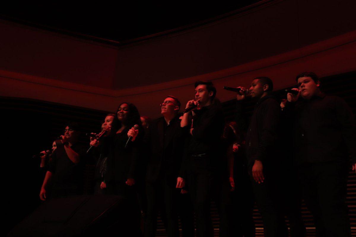 Radiating her vocal talent, Takaylan Johnson(middle) takes the reins of the UT Singers at their homecoming concert on Friday, November 1, 2019.