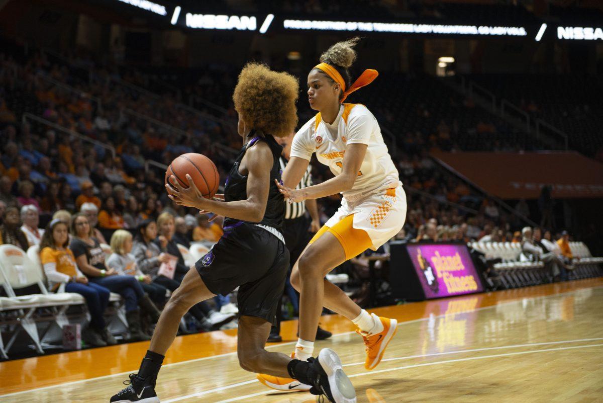 Rae Burrell, #12, guards a Central Arkansas player during the game at Thompson-Boling Arena on Thursday, November 7, 2019.