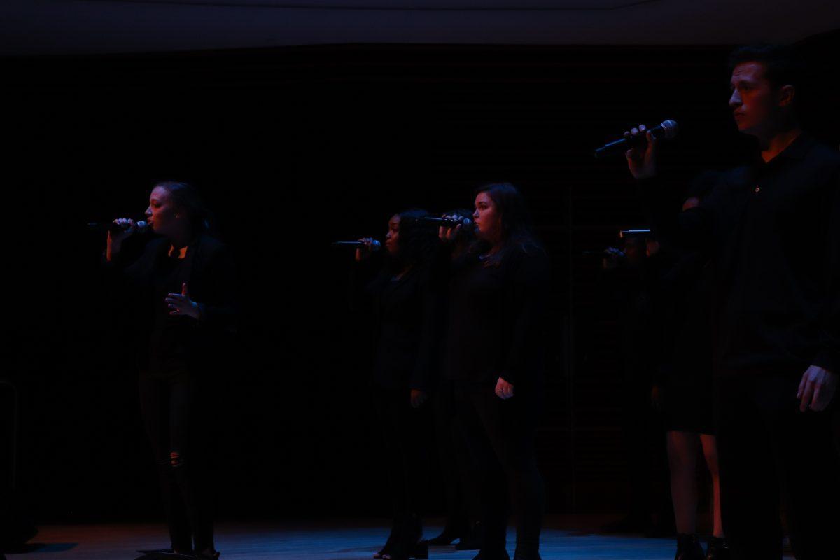 Jordyn Lantz (left) and Jack Rosamond (right) take the lead on the Singers' performance of "Alone" by Billy Steinberg during the Homecoming Concert on Friday, November 1, 2019.
