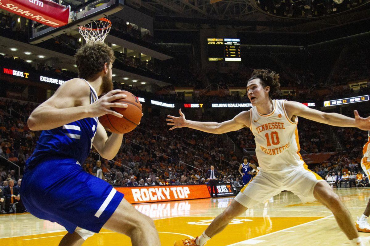 John Fulkerson, #10, blocks the UNC Asheville player from passing the ball during the game at Thompson-Boling Arena on Tuesday, November 5, 2019.