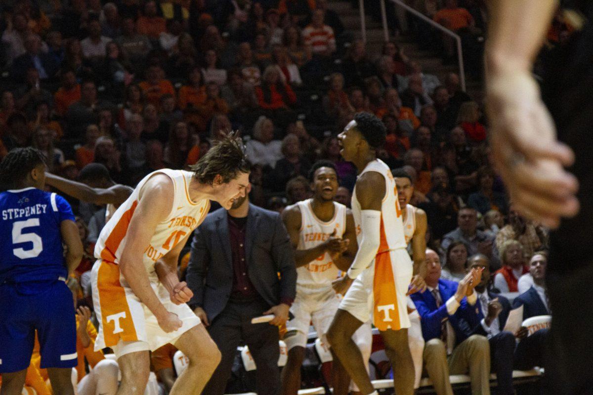Tennessee teammates celebrate during the game against UNC Asheville at Thompson-Boling Arena on Tuesday, November 5, 2019.