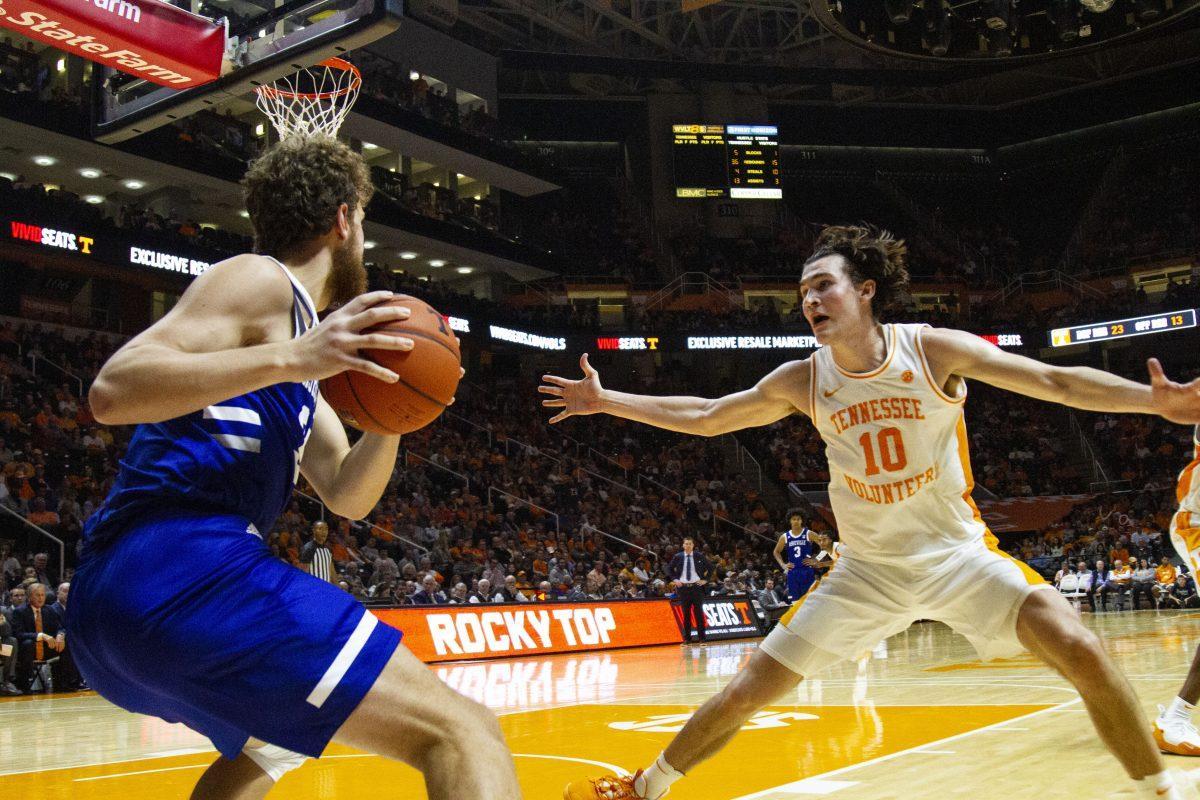 John Fulkerson, #10, blocks the UNC Asheville player from passing the ball during the game at Thompson-Boling Arena on Tuesday, November 5, 2019.